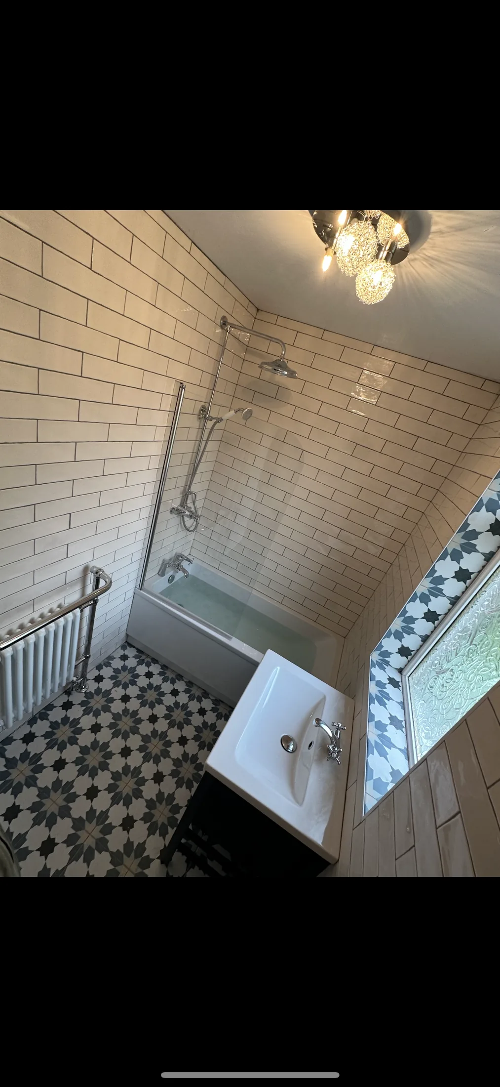 Walk-in shower fitted with tiled walls